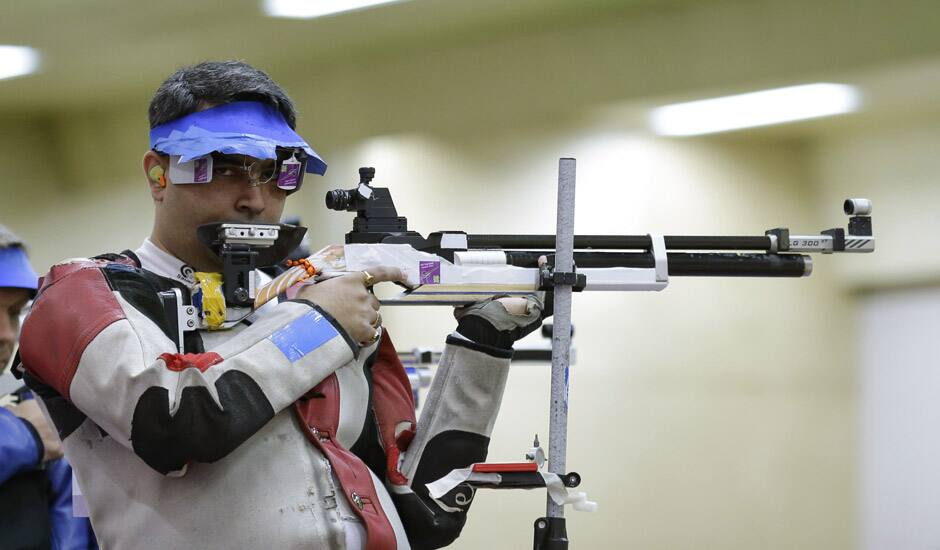 Gagan Narang shoots during qualifiers for the men's 10-meter air rifle event at the 2012 Summer Olympics in London.