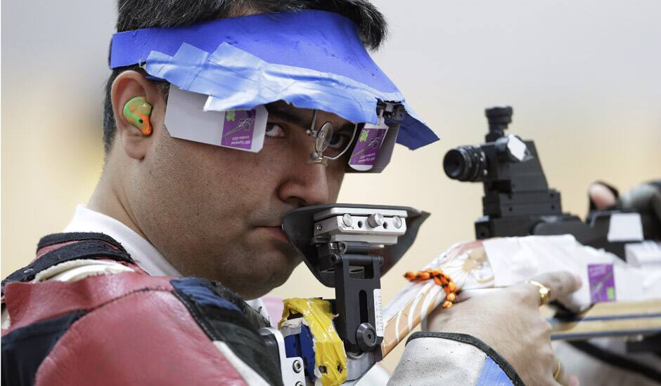 Gagan Narang shoots during qualifiers for the men's 10-meter air rifle event at the 2012 Summer Olympics in London.