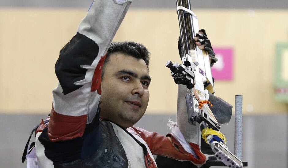 Gagan Narang celebrates winning the bronze medal at the end of the men's 10-meter air rifle at the 2012 Summer Olympics in London. 