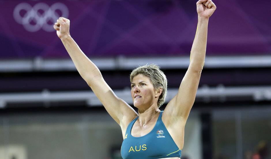 Nat Cook of Australia reacts to the crowd in a contest against Austria during a beach volleyball match at the 2012 Summer Olympics.