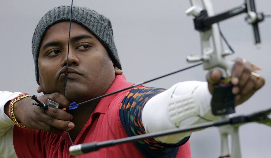 Jayanta Talukdar shoots during an elimination round of the individual archery competition at the 2012 Summer Olympics in London.