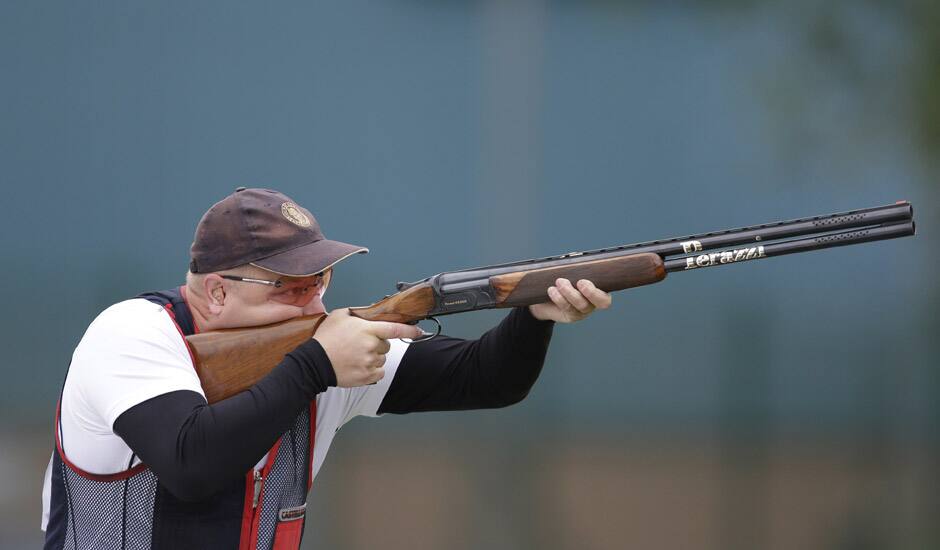 Norway's Tore Brovold shoots during the second day of qualifiers for the men's skeet event at the 2012 Summer Olympics in London.