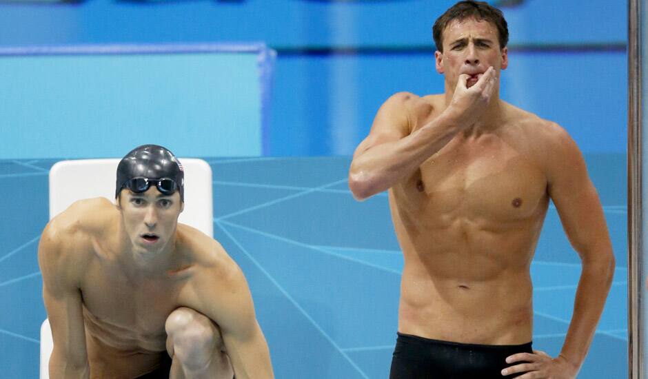 United States' Michael Phelps waits to start the final leg of the men's 4X200-meter freestyle relay as teammate Ryan Lochte, right, whistles to cheer on their teammate before their gold medal win at the Aquatics Centre in the Olympic Park during the 2012 Summer Olympics, London.