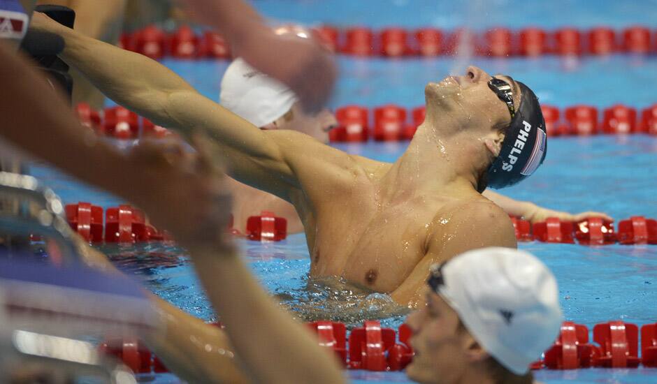 United States' Michael Phelps celebrates winning gold in the men's 4x200-meter freestyle relay swimming final at the Aquatics Centre in the Olympic Park during the 2012 Summer Olympics in London.