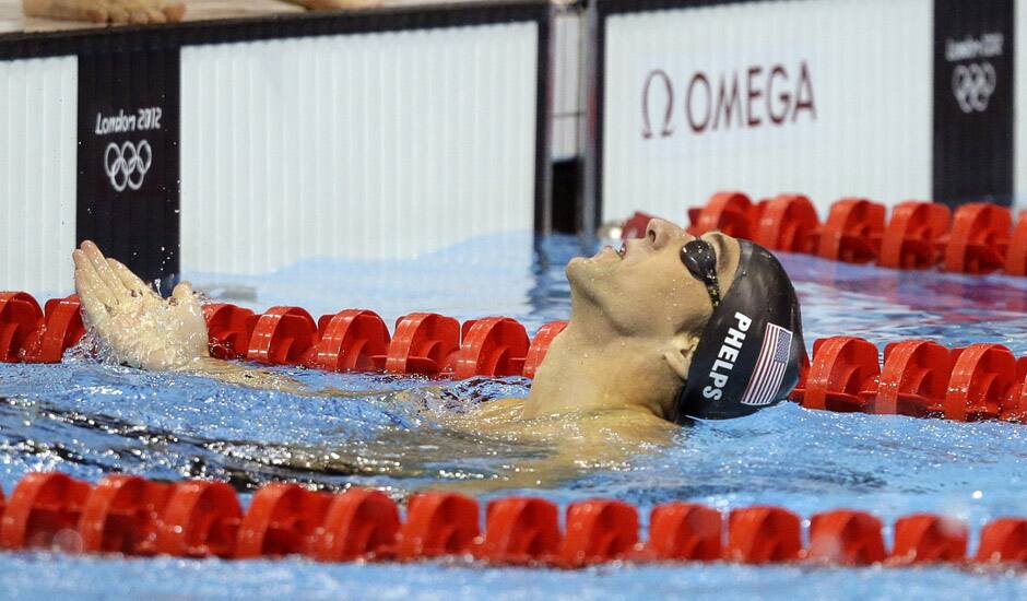 United States' Michael Phelps reacts after winning gold in the men's 4x200-meter freestyle relay swimming final at the Aquatics Centre in the Olympic Park during the 2012 Summer Olympics in London.