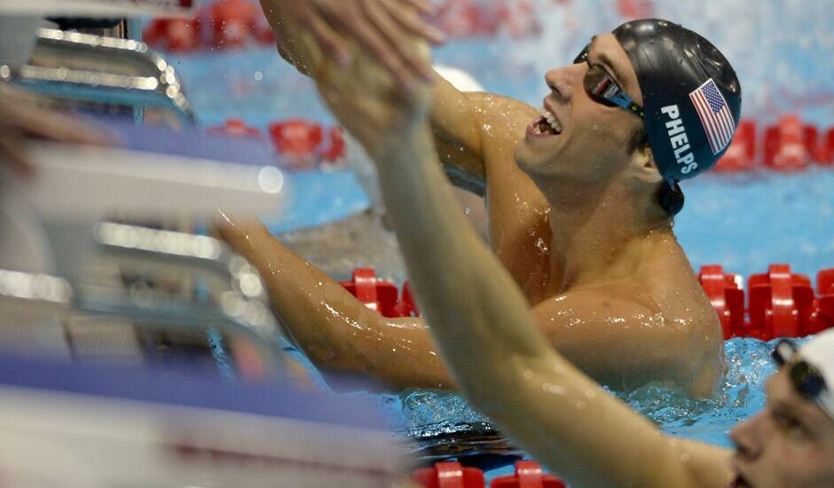 United States' Michael Phelps celebrates after winning gold in the men's 4x200-meter freestyle relay swimming final at the Aquatics Centre in the Olympic Park during the 2012 Summer Olympics in London.