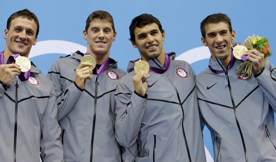 United States' Michael Phelps poses with his medal for the men's 4x200-meter freestyle relay swimming final at the Aquatics Centre in the Olympic Park during the 2012 Summer Olympics in London.