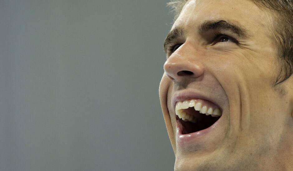 United States' Michael Phelps reacts after receiving his gold medal for the men's 4x200-meter freestyle relay swimming final at the Aquatics Centre in the Olympic Park during the 2012 Summer Olympics in London.