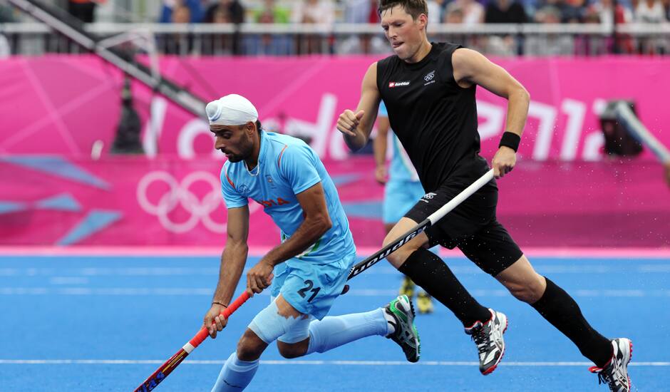 Sandeep Singh controls the ball against New Zealand during their men's hockey preliminary round match at the 2012 Summer Olympics.