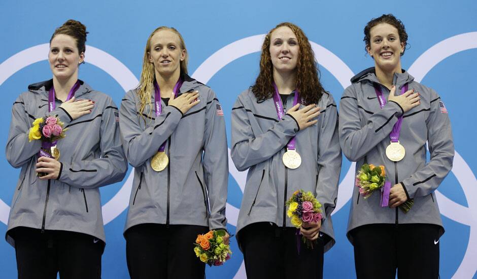 From left, United States' Missy Franklin, United States' Dana Vollmer, United States' Shannon Vreeland and United States' Allison Schmitt pose with their gold medals for the women's 4x200-meter freestyle relay swimming final at the Aquatics Centre in the Olympic Park during the 2012 Summer Olympics.