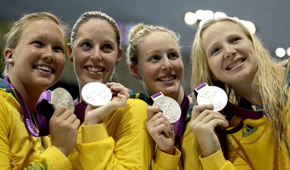 Australia's women's 4 X 200-meter freestyle relay team from left, Kylie Palmer, Alicia Coutts, Bronte Barratt, and Melanie Schlanger pose with their silver medals at the Aquatics Centre in the Olympic Park during the 2012 Summer Olympics.