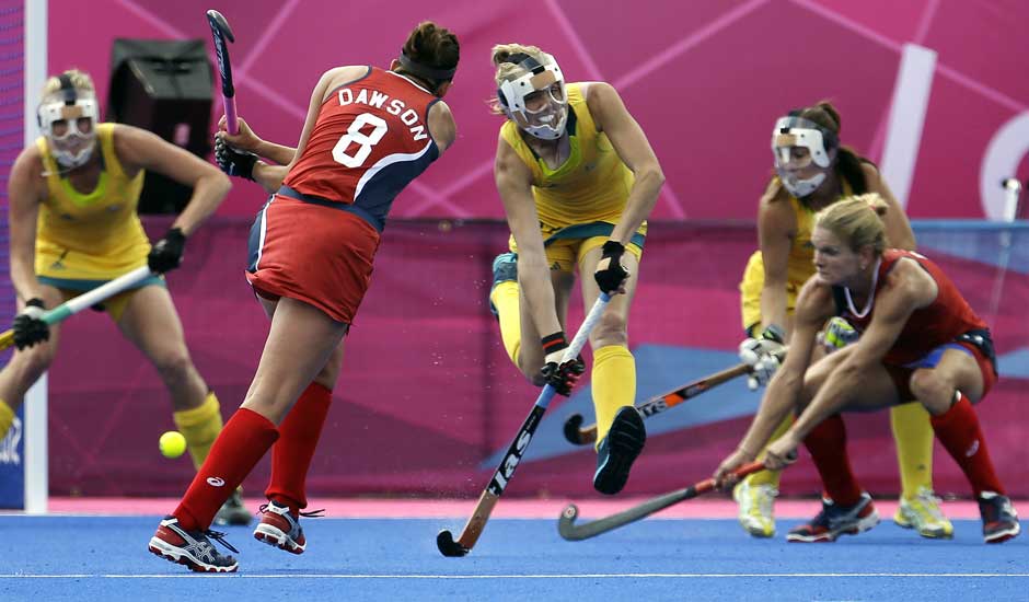 United States' Rachel Dawson (8) attempts to score against Australia during their women's hockey preliminary match against the United States at the 2012 Summer Olympics.