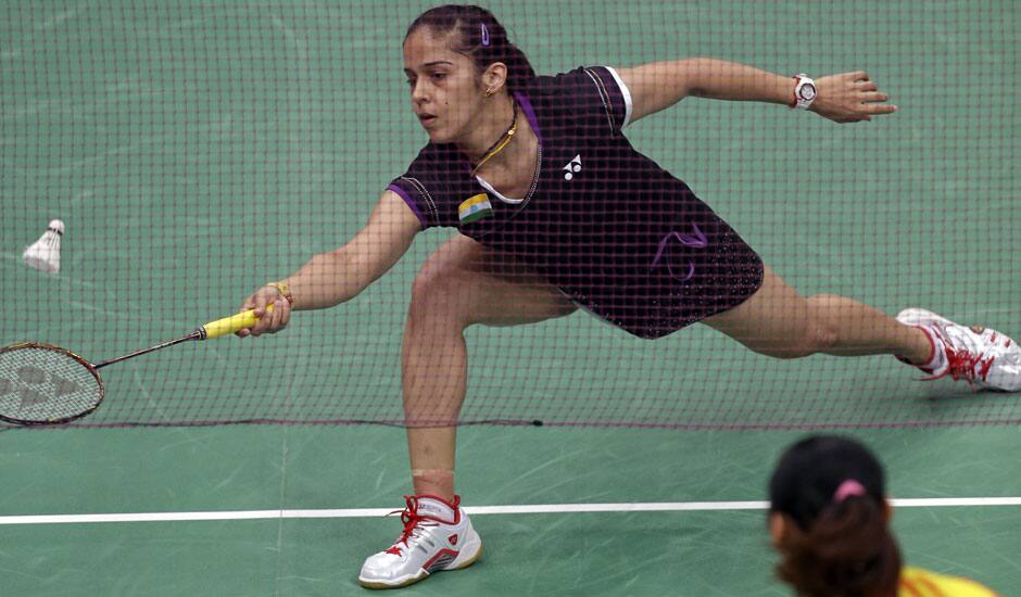 Saina Nehwal plays against China's Wang Yihan, right, in a women's singles badminton semifinal match at the 2012 Summer Olympics.