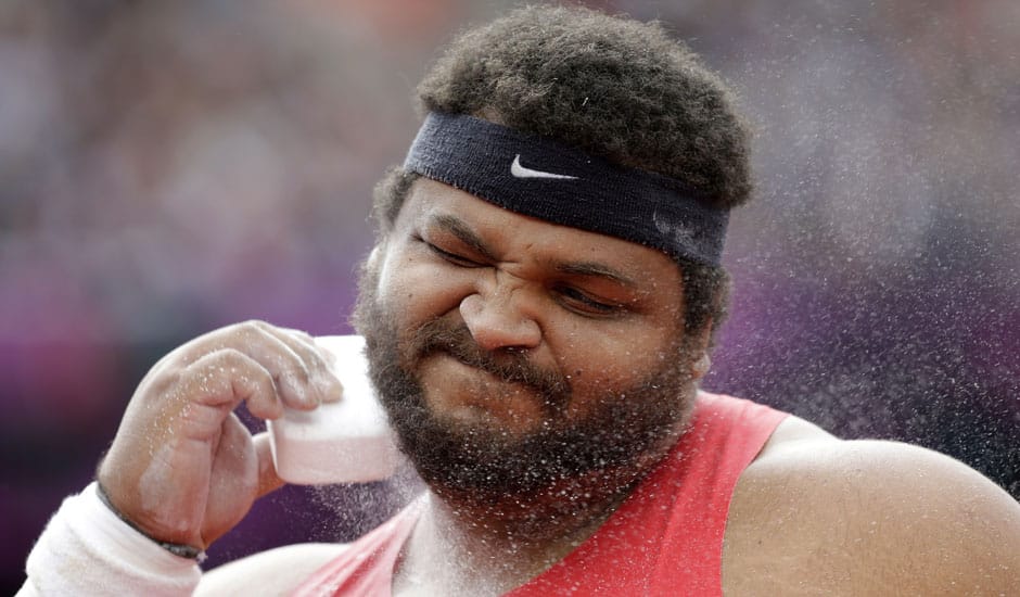 Reese Hoffa of the United States prepares for an attempt in the qualification for the men's Shot Put during the athletics in the Olympic Stadium at the 2012 Summer Olympics, London.