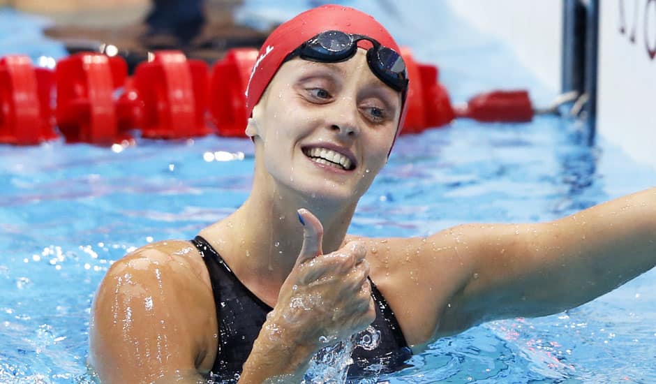 Britain's Francesca Halsall celebrates after competing in a 50-meter freestyle swimming heat at the Aquatics Centre in the Olympic Park during the 2012 Summer Olympics, London.