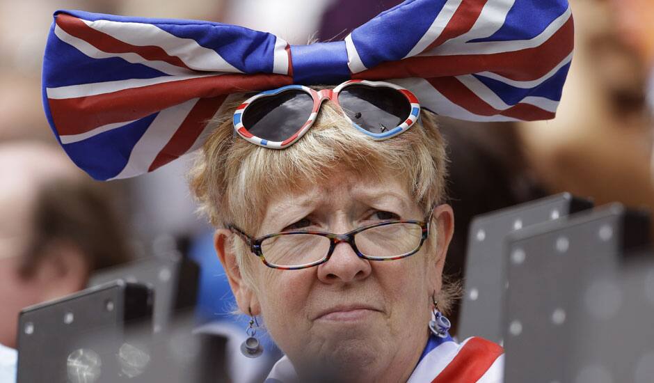 A supporter of Britain watches the athletics competitions at the 2012 Summer Olympics in London.