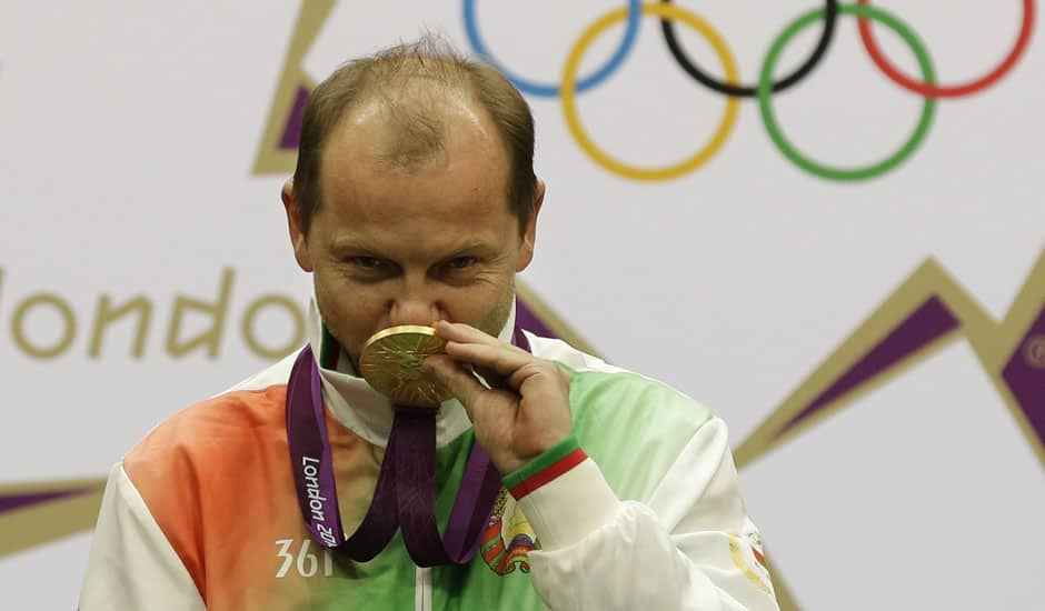 Belarus' Sergei Martynov kisses his gold medal, during the victory ceremony for the men's 50-meter rifle prone, at the 2012 Summer Olympics in London.