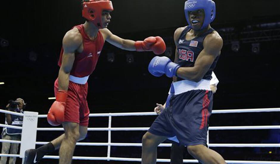 India's Krishan Vikas, left, fights United States' Errol Spence during a men's welterweight 69-kg preliminary boxing match at the 2012 Summer Olympics.