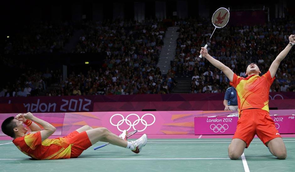 China's Fu Haifeng, left, and Cai Yun celebrate after beating Koo Kien Keat and Tan Boon Heong, of Malaysia, in a men's doubles badminton semifinal match at the 2012 Summer Olympics.