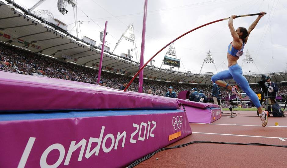 Russia's Yelena Isinbayeva practices ahead of the women's pole vault qualification during the athletics in the Olympic Stadium at the 2012 Summer Olympics.