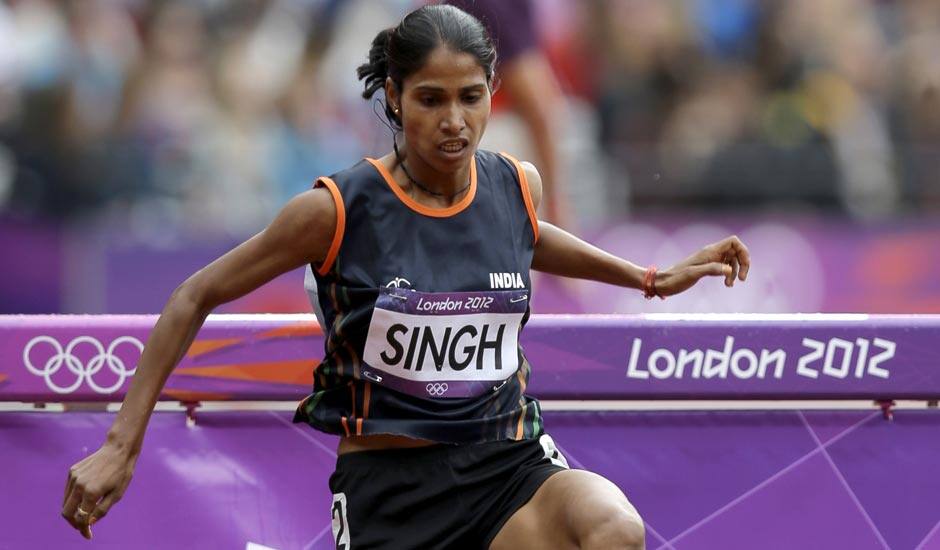 Sudha Singh jumps during a heat of the women's 3000-meter steeplechase during the athletics in the Olympic Stadium at the 2012 Summer Olympics.