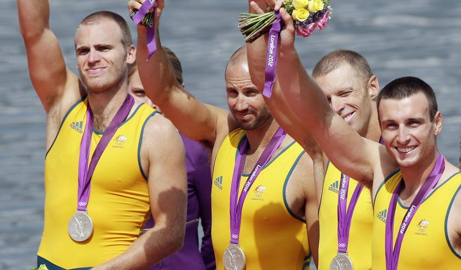 Australia's from right, Joshua Dunkley-Smith, Drew Ginn, James Chapman and William Lockwood celebrate after winning the silver medal for the men's rowing four in Eton Dorney, near Windsor, at the 2012 Summer Olympics.