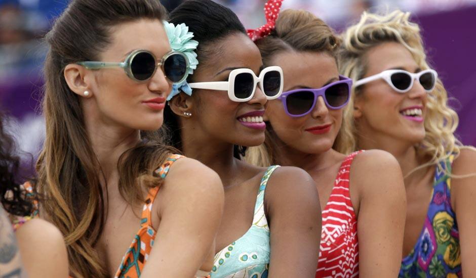 Dancing perform during a beach volleyball match at the 2012 Summer Olympics.