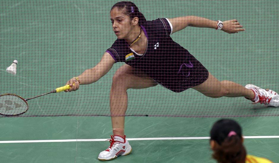 Saina Nehwal plays against China's Wang Yihan, right, in a women's singles badminton semifinal match at the 2012 Summer Olympics.