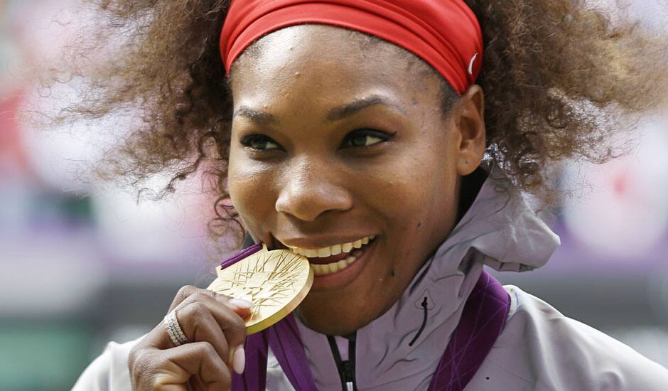 Gold medalist United States' Serena Williams pose during the podium ceremony of the women's singles final match at the All England Lawn Tennis Club at Wimbledon, in London, at the 2012 Summer Olympics