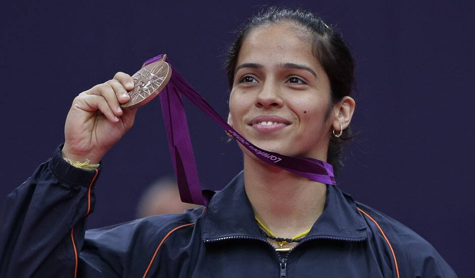 Saina Nehwal shows his bronze medal of the badminton women's singles at the 2012 Summer Olympics.