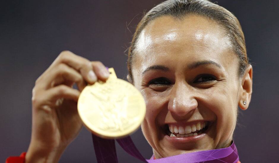 Britain's Jessica Ennis poses with her gold medal for the heptathlon during the athletics in the Olympic Stadium at the 2012 Summer Olympics.