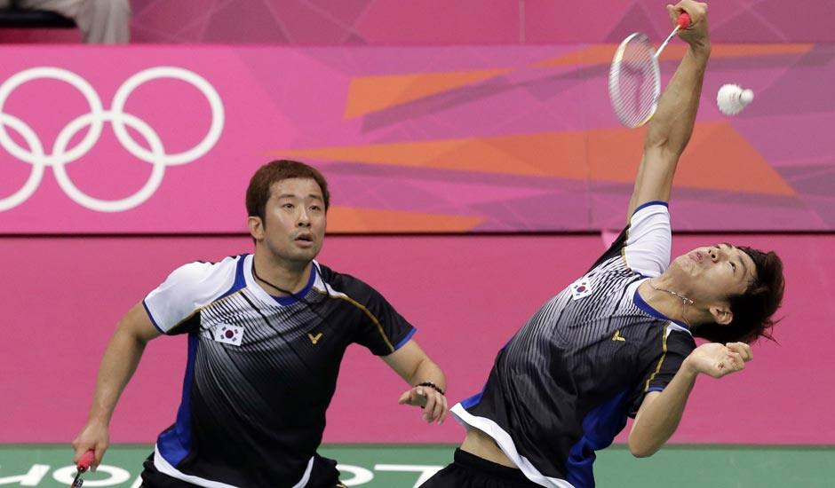 South Korea's Lee Yong-dae, right, and Chung Jae-sung play against Malaysia's Koo Kien Keat and Tan Boon Heong in the men's doubles badminton bronze medal match at the 2012 Summer Olympics.