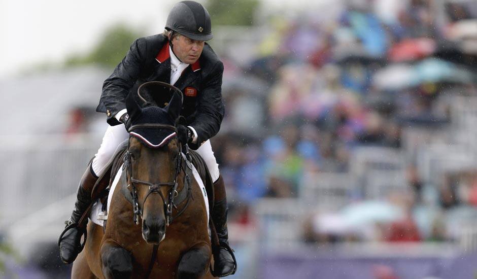 Nick Skelton, of Great Britain, rides Big Star, during the equestrian show jumping competition at the 2012 Summer Olympics.