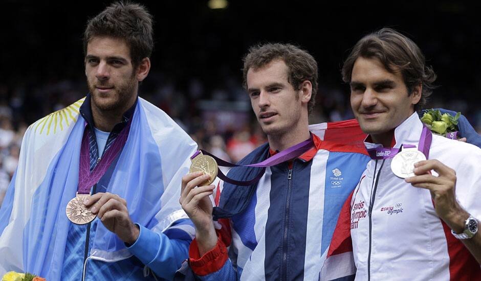 From right, silver medalist Switzerland's Roger Federer, gold medalist Andy Murray of Great Britain, and bronze medalist Juan Martin del Potro of Argentina pose after the medal ceremony of the men's singles event at the All England Lawn Tennis Club at Wimbledon, in London, at the 2012 Summer Olympic