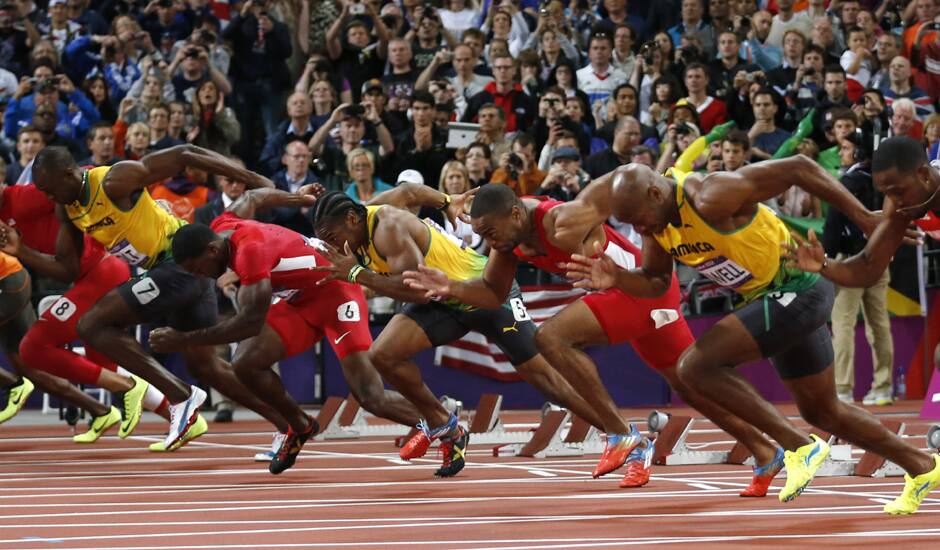 From right, Trinidad's Richard Thompson, Jamaica's Asafa Powell, United States' Tyson Gay, Jamaica's Yohan Blake, United States' Justin Gatlin, Jamaica's Usain Bolt, United State's Ryan Bailey, and Netherlands' Churandy Martina start in the men's 100-meters final during the athletics in the Olympic