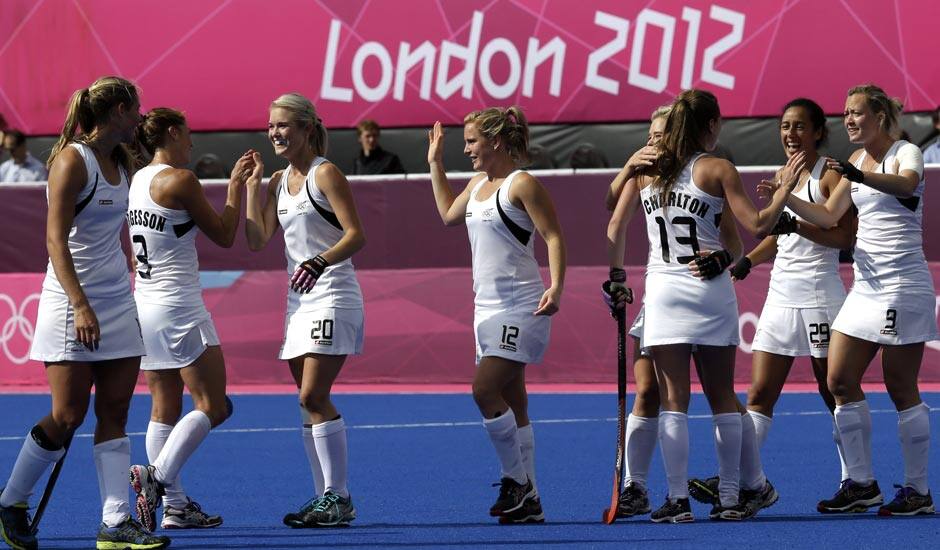 New Zealand players celebrate after qualifying for semifinals following a scoreless women's hockey match against Germany at the 2012 Summer Olympics.