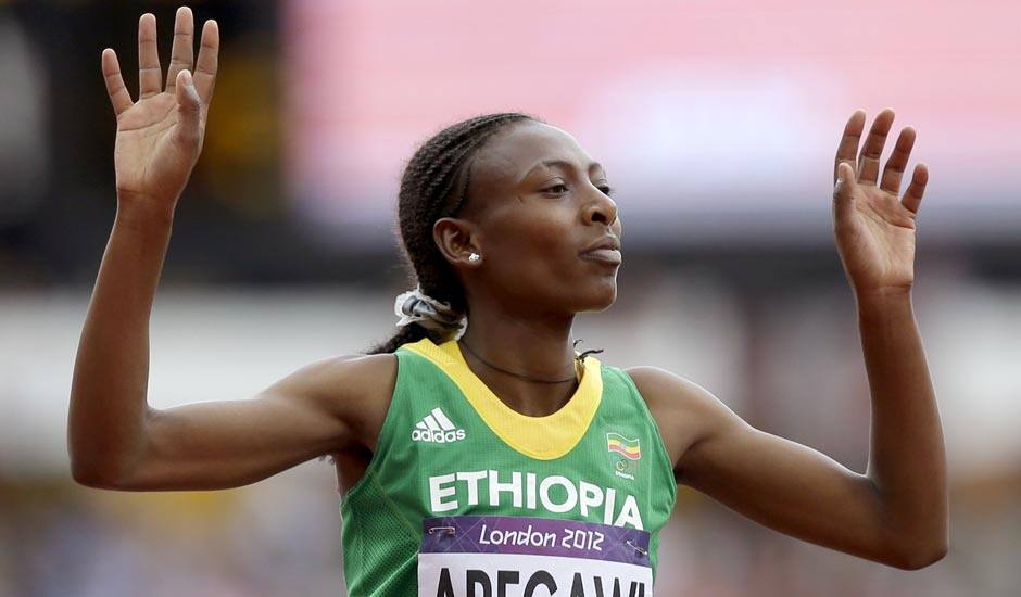 Ethiopia's Abeba Aregawi reacts after competing in a women's 1500-meter heat during the athletics in the Olympic Stadium at the 2012 Summer Olympics.