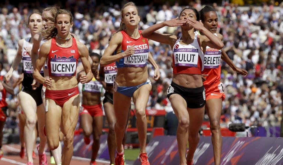 Turkey's Gamze Bulut celebrates as she crosses the finish line to win her women's 1500-meters heat during the athletics in the Olympic Stadium at the 2012 Summer Olympics.