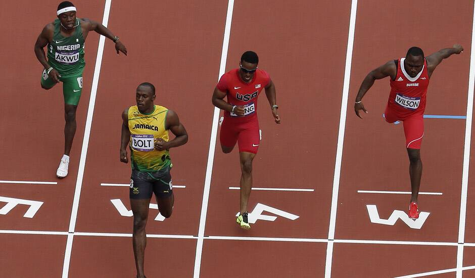 Jamaica's Usain Bolt wins his heat during the first found of the men's 200-meter at athletics in the Olympic Stadium at the 2012 Summer Olympics, London.