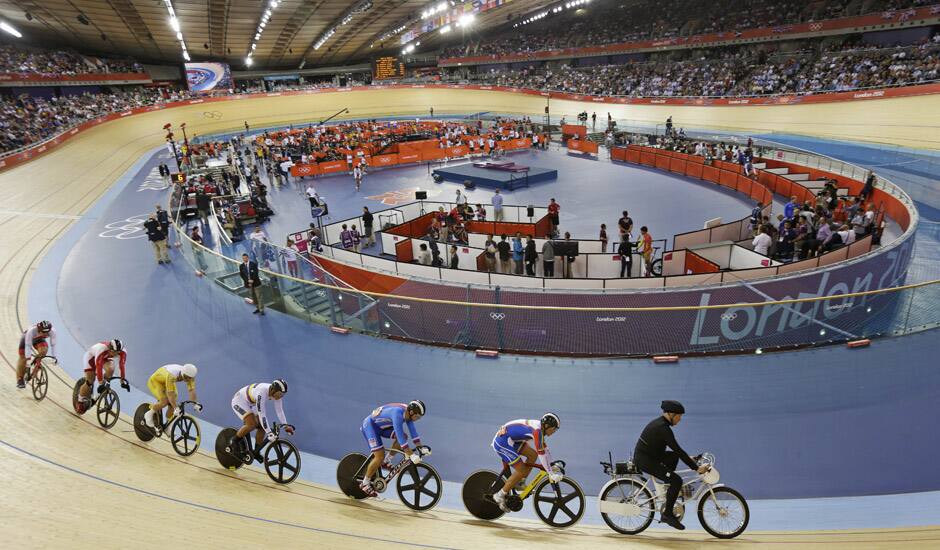 Cyclists compete in a track cycling men's keirin event, during the 2012 Summer Olympics in London. 