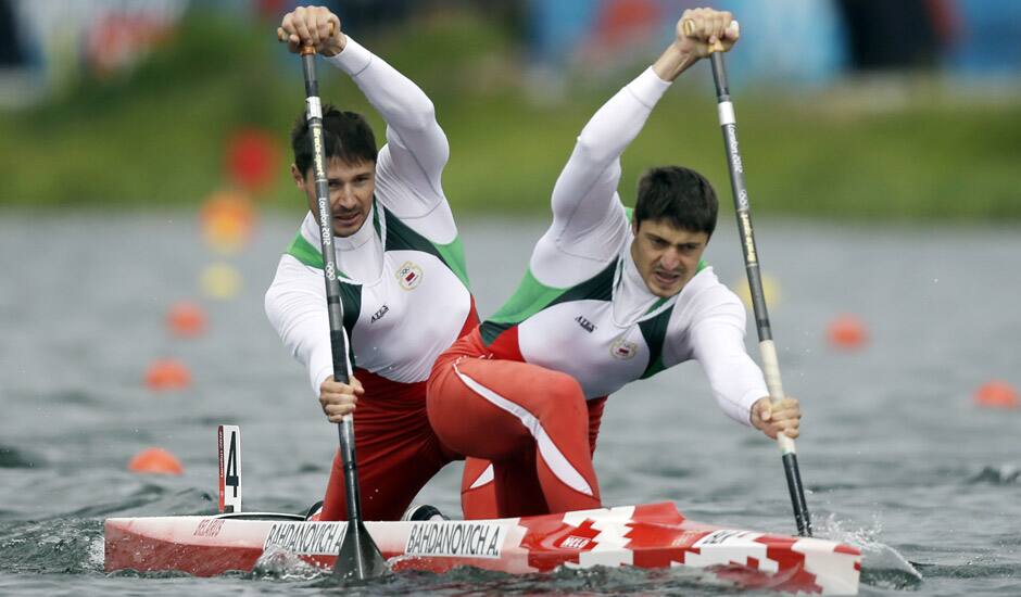 Belarus' Andrei and Aliaksandr Bahdanovich paddle in men's canoe double 1000m semifinal in Eton Dorney, near Windsor, England, at the 2012 Summer Olympics.