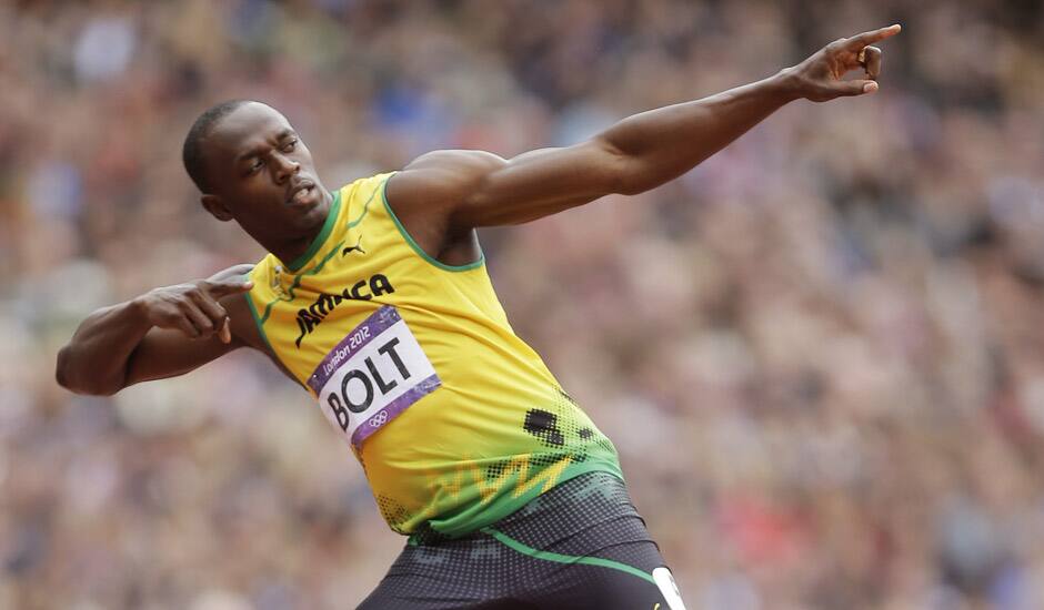 Jamaica's Usain Bolt gestures before competing in a men's 200-meter heat during the athletics in the Olympic Stadium at the 2012 Summer Olympics, London.