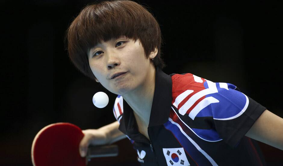 South Korea's Seok Ha-jung serves to Singapore's Li Jiawei in a women's team table tennis bronze medal match at the 2012 Summer Olympics in London. 