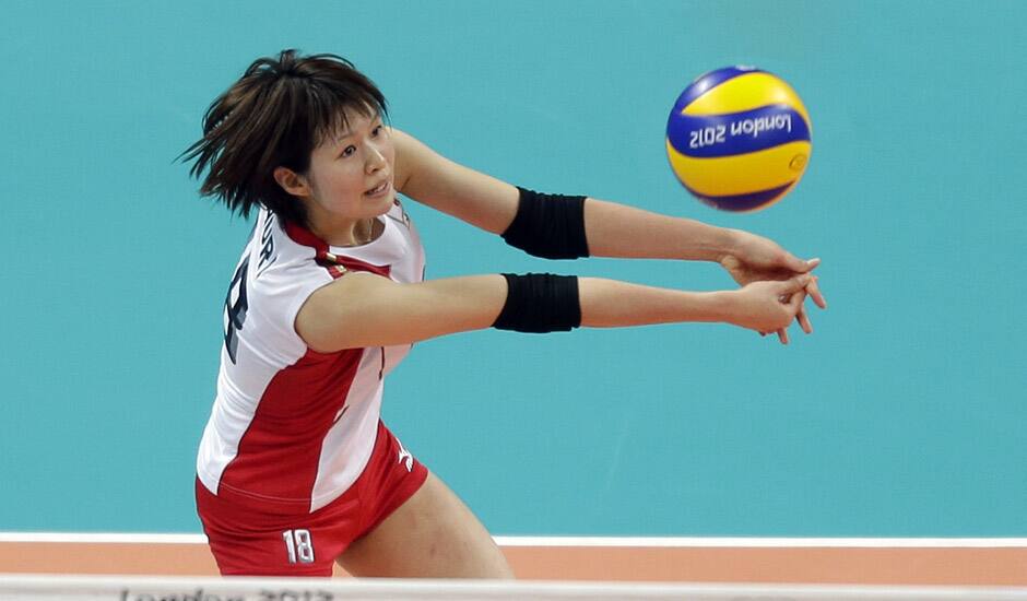 Japan's Saori Kimura (18) prepares to pass the ball to a teammate against China during a women's volleyball quarterfinal match at the 2012 Summer Olympics  in London.