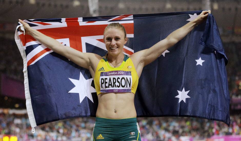 Australia's Sally Pearson celebrates her gold medal win in the women's 100-meter hurdles during the athletics in the Olympic Stadium at the 2012 Summer Olympics.