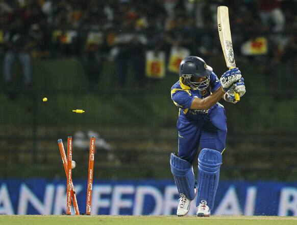 Tillakaratne Dilshan loses his wicket during a Twenty20 cricket match between India and Sri Lanka in Pallekele.