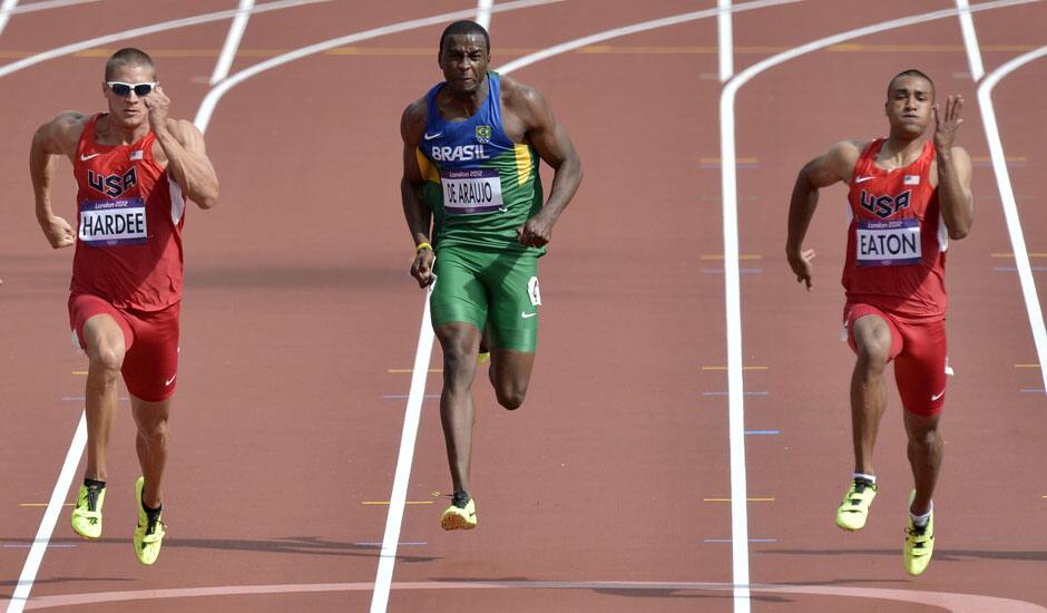 United States' Trey Hardee, Brazil's Luiz Alberto De Araujo and United States' Ashton Eaton compete in a men's decathlon 100-meter heat during the athletics in the Olympic Stadium at the 2012 Summer Olympics.