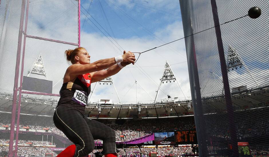 Germany's Betty Heidler takes a throw in a women's hammer throw qualification round during the athletics in the Olympic Stadium at the 2012 Summer Olympics.