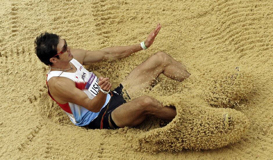 Japan's Keisuke Ushiro competes in the men's decathlon long jump during the athletics in the Olympic Stadium at the 2012 Summer Olympics in London