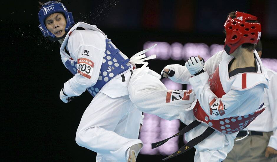 Japan's Keisuke Ushiro competes in the men's decathlon long jump during the athletics in the Olympic Stadium at the 2012 Summer Olympics in London.